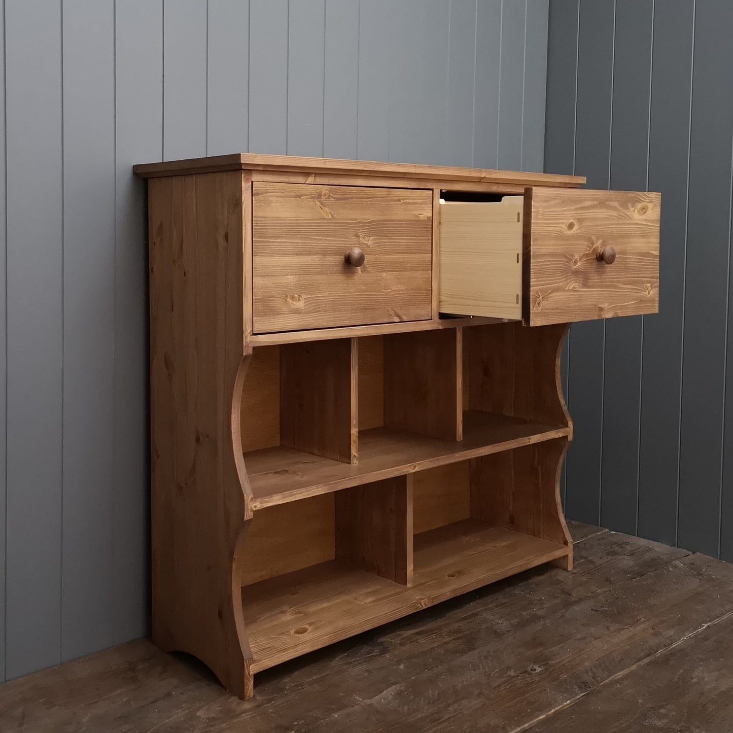 Hand made solid wood shoe rack with two deep drawers.
