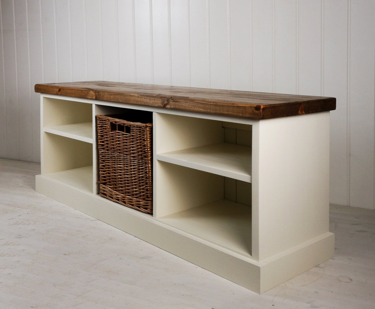 Painted two shelf shoe rack with storage basket in the middle. Antique pine rustic top strong enough to sit on.
