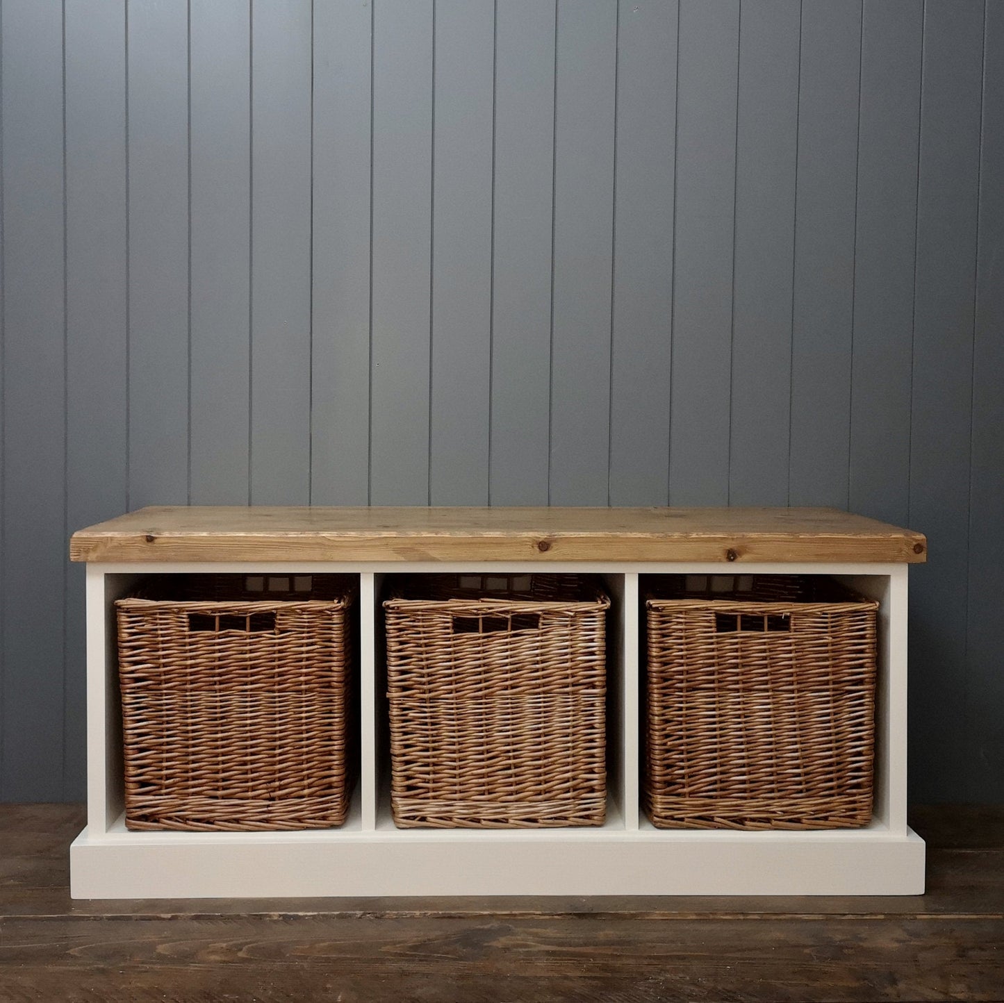 Handmade solid wood painted hallway bench with 3 large wicker baskets for storing shoes.
