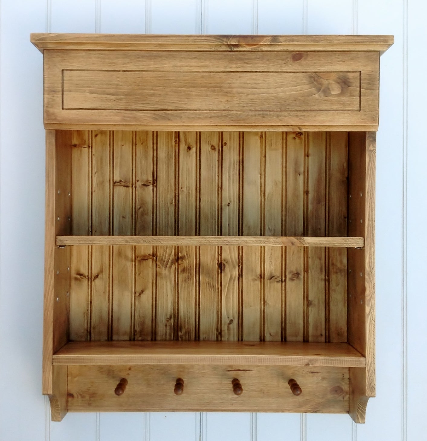 Hand made antique pine spice rack with adjustable shelf and 4 mug pegs.