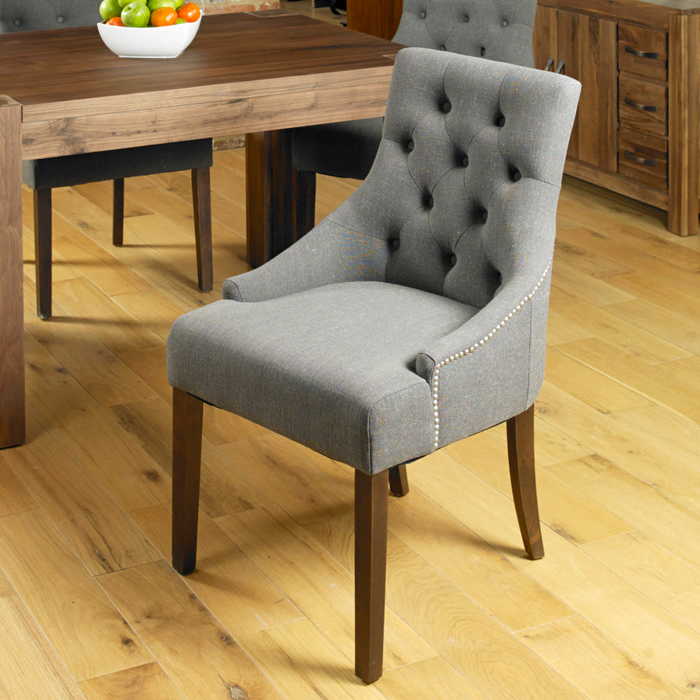 Walnut Accent Upholstered Dining Chair - Slate (Pack Of Two) : Accent upholstered dining chair. sold as a pack of two. The fabric colour is Slate, it comes with a hardwood frame and walnut legs. Stylish solutions for contemporary dining. Part of our  Walnut dining room furniture range.