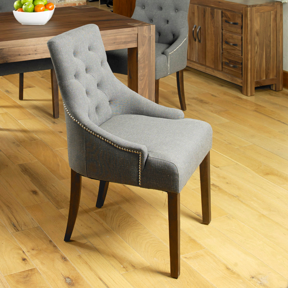 Walnut Accent Upholstered Dining Chair - Slate (Pack Of Two) : Accent upholstered dining chair. sold as a pack of two. The fabric colour is Slate, it comes with a hardwood frame and walnut legs. Stylish solutions for contemporary dining. Part of our  Walnut dining room furniture range.