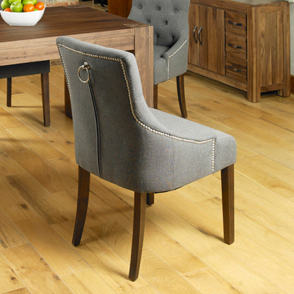 Walnut Accent Upholstered Dining Chair - Slate (Pack Of Two) : Accent upholstered dining chair. sold as a pack of two. The fabric colour is Slate, it comes with a hardwood frame and walnut legs. Stylish solutions for contemporary dining. Part of our  Walnut dining room furniture range.