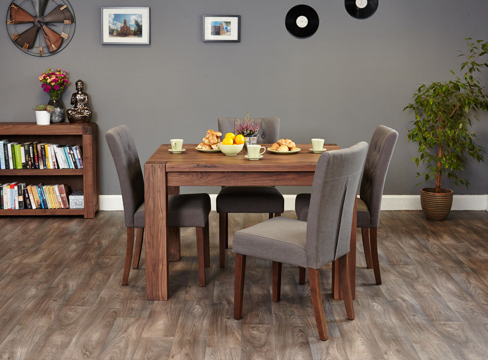Walnut Dining Table (4 Seater) : Walnut four seater dining table. Stylish solutions for contemporary dining. Part of the Walnutdining room furniture range.