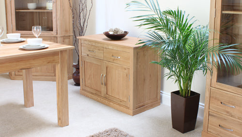 Oak Small Sideboard :  small oak sideboard. two doors and two drawers Quality storage solutions for contemporary living. Part of the  Oak dining room furniture range.
