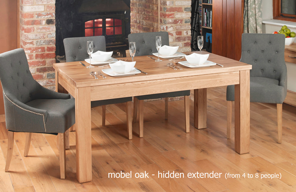 Hidden Extending Oak Dining Table (Seats 4-8) :  oak extending six / eight seater dining table. Stylish solutions for contemporary dining. Part of the  Oak dining room furniture range.