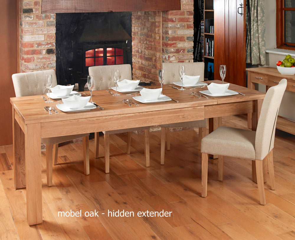 Hidden Extending Oak Dining Table (Seats 4-8) :  oak extending six / eight seater dining table. Stylish solutions for contemporary dining. Part of the  Oak dining room furniture range.