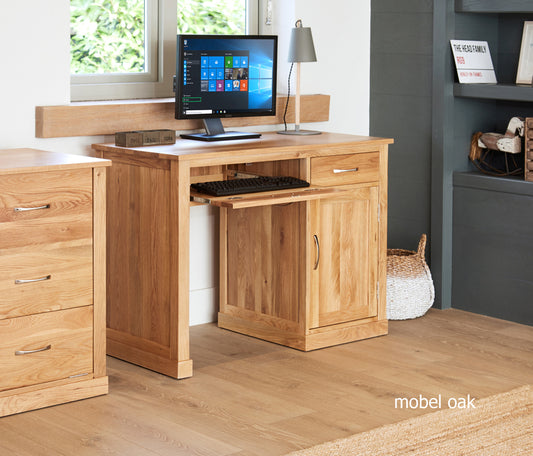 Oak Single Pedestal Computer Desk :  Oak single pedestal computer desk. A superb computer desk designed to hide away your tower unit and keyboard. Part of the  Oak home office furniture range.