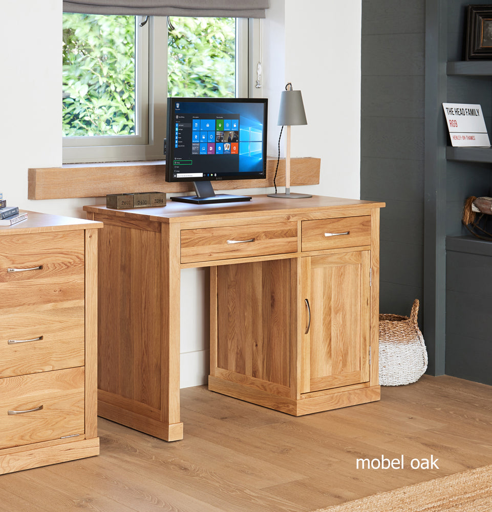 Oak Single Pedestal Computer Desk :  Oak single pedestal computer desk. A superb computer desk designed to hide away your tower unit and keyboard. Part of the  Oak home office furniture range.
