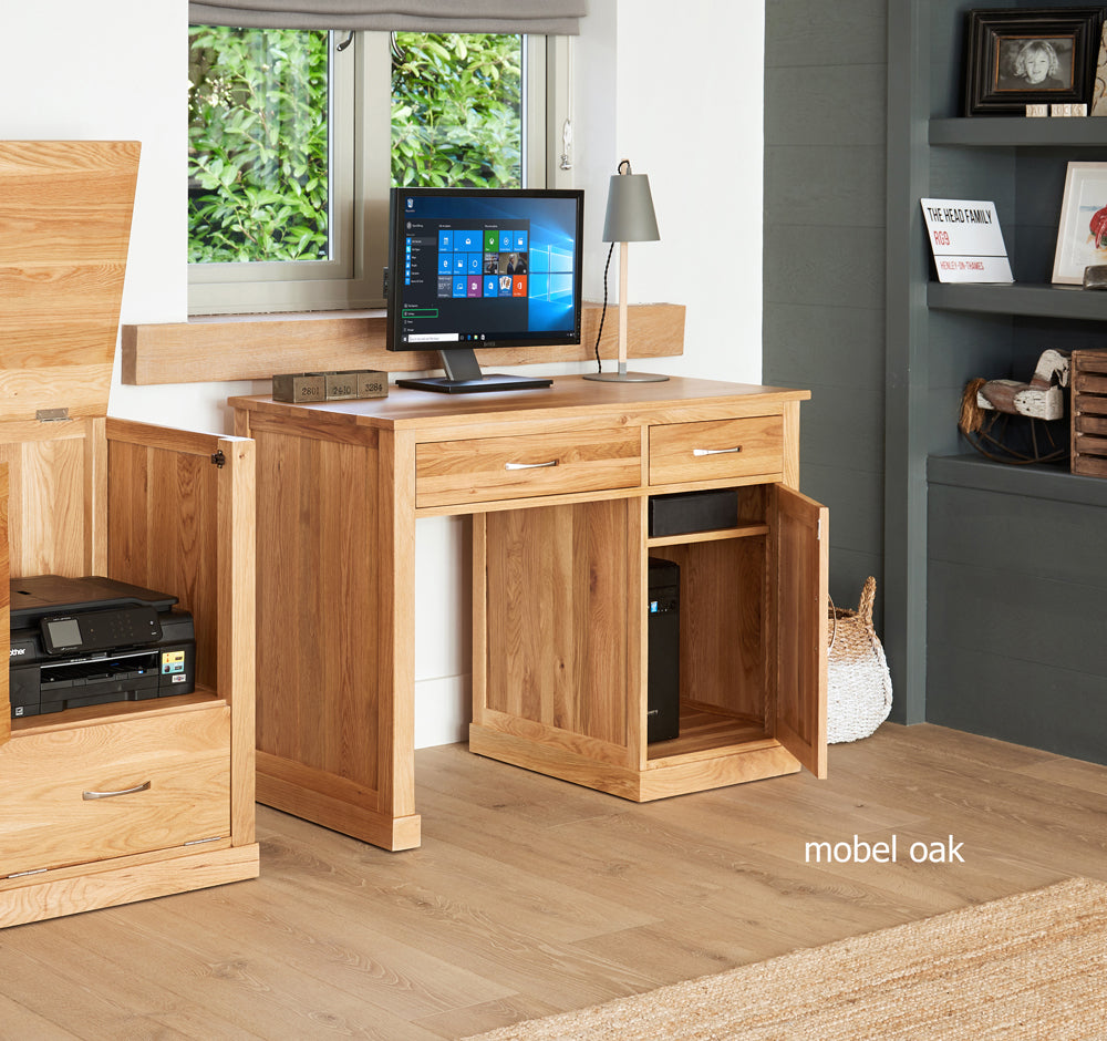 Oak Single Pedestal Computer Desk :  Oak single pedestal computer desk. A superb computer desk designed to hide away your tower unit and keyboard. Part of the  Oak home office furniture range.