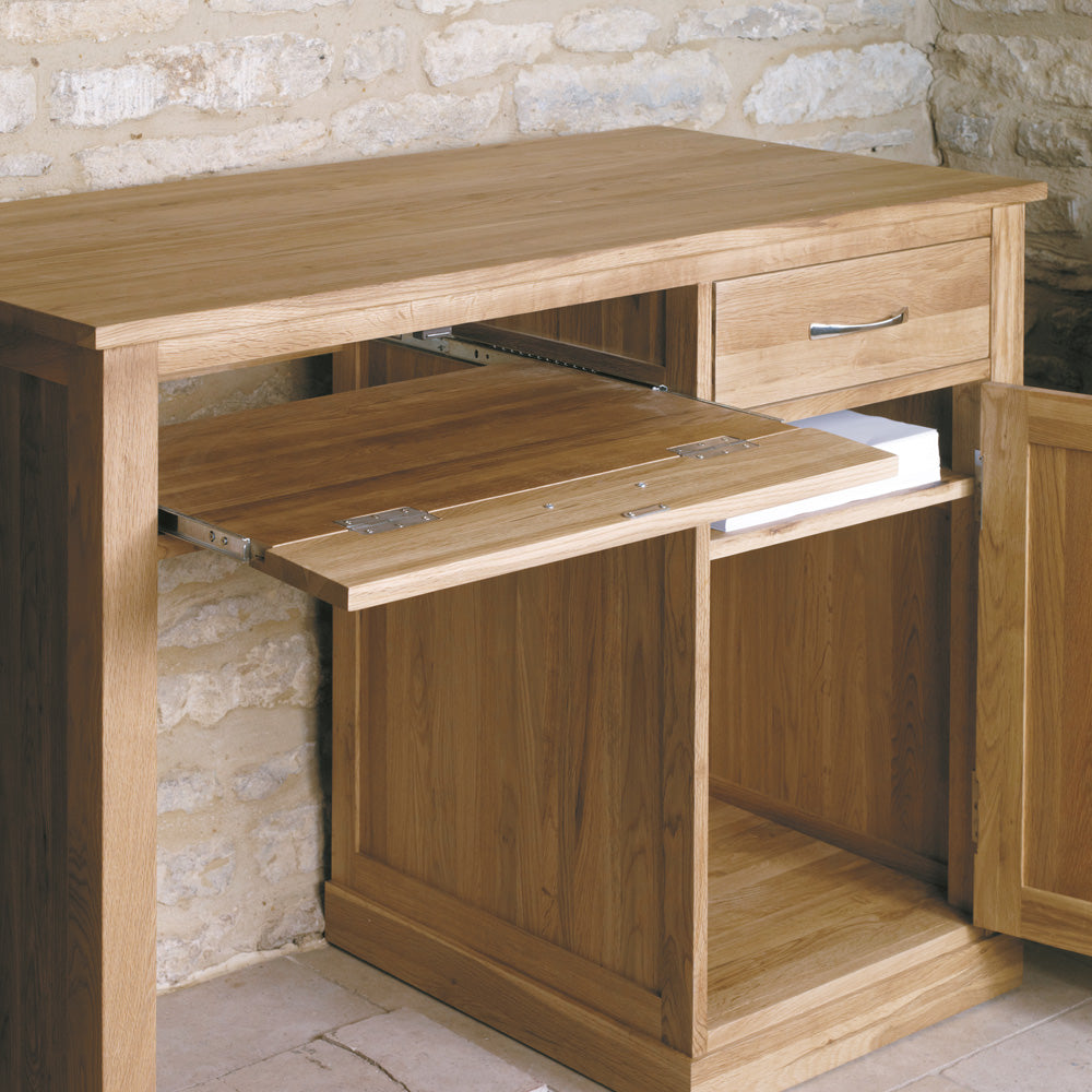 Oak Single Pedestal Computer Desk :  Oak single pedestal computer desk. A superb computer desk designed to hide away your tower unit and keyboard. Part of the  Oak home office furniture range.