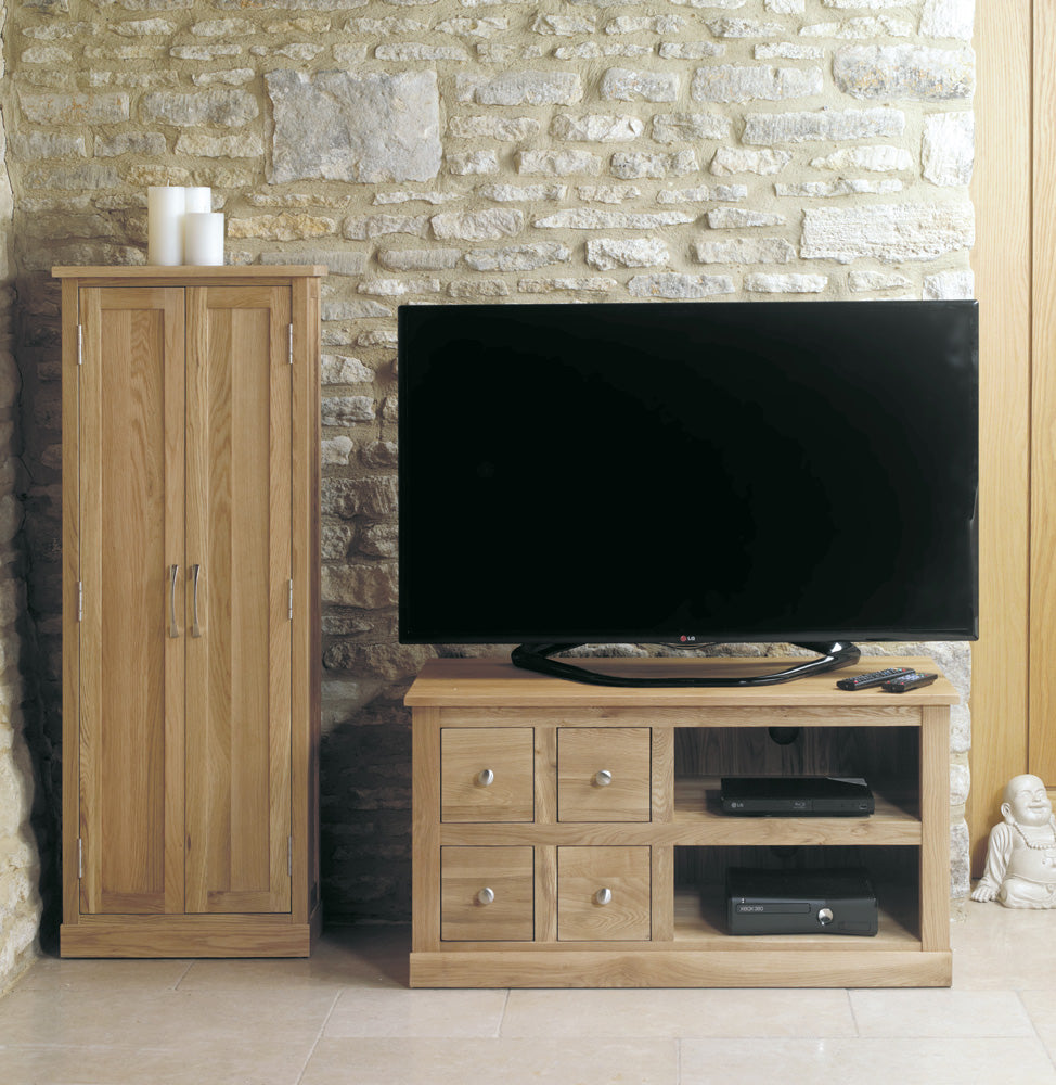 Oak Four Drawer Television Cabinet :  Oak four drawer television (TV) and DVD cabinet. Stylish solutions for contemporary living. Part of the  Oak living room furniture range.