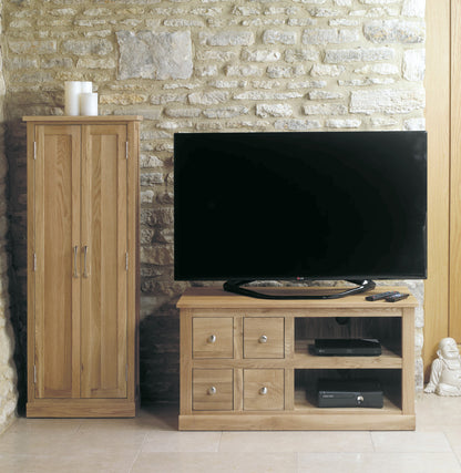 Oak Four Drawer Television Cabinet :  Oak four drawer television (TV) and DVD cabinet. Stylish solutions for contemporary living. Part of the  Oak living room furniture range.
