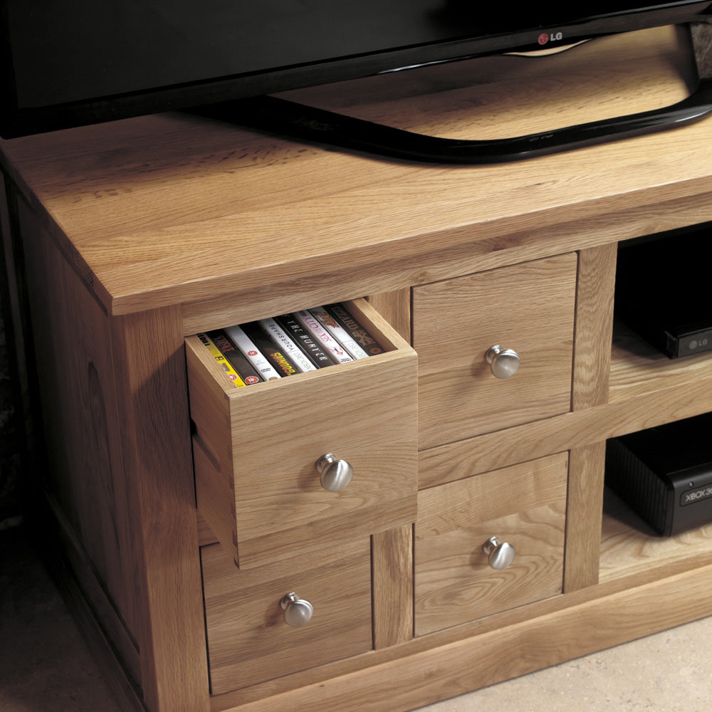 Oak Four Drawer Television Cabinet :  Oak four drawer television (TV) and DVD cabinet. Stylish solutions for contemporary living. Part of the  Oak living room furniture range.