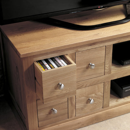 Oak Four Drawer Television Cabinet :  Oak four drawer television (TV) and DVD cabinet. Stylish solutions for contemporary living. Part of the  Oak living room furniture range.