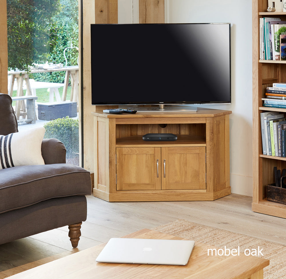 Oak Corner Television Cabinet :  Oak corner television (TV) and DVD cabinet. Stylish solutions for contemporary living. Part of the  Oak living room furniture range.