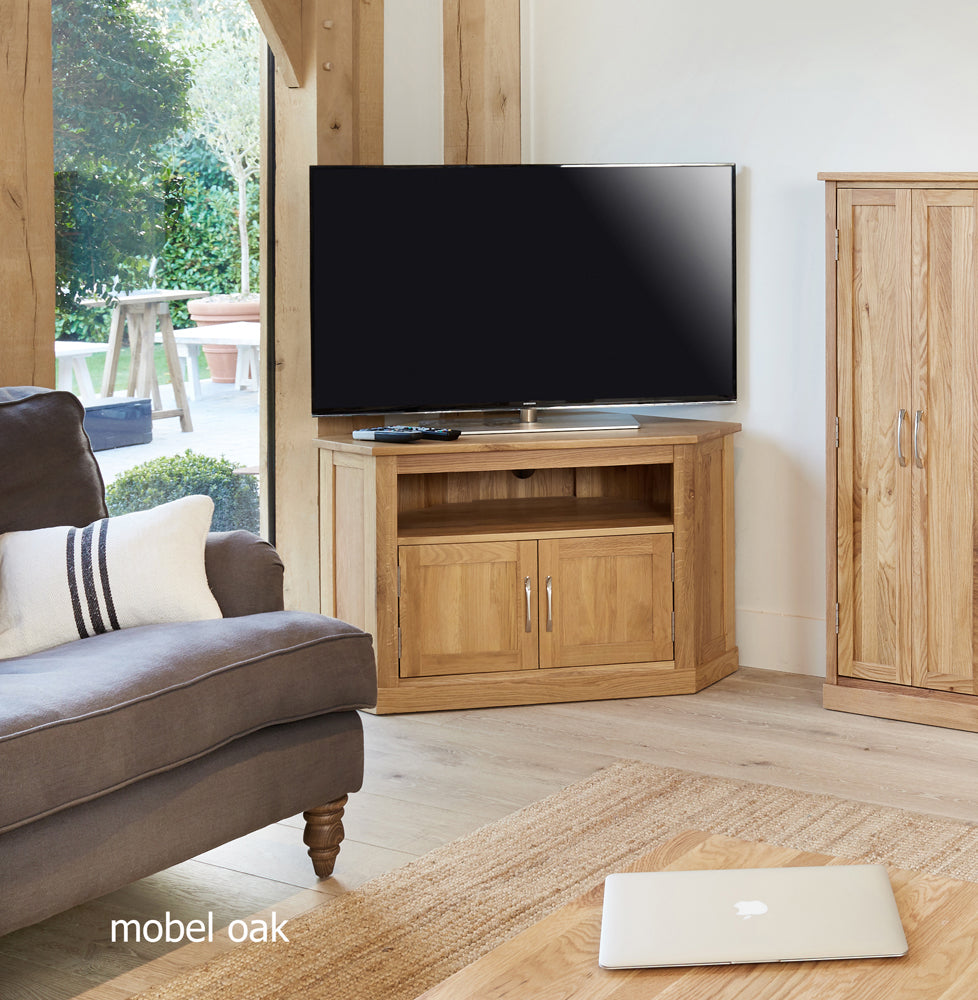 Oak Corner Television Cabinet :  Oak corner television (TV) and DVD cabinet. Stylish solutions for contemporary living. Part of the  Oak living room furniture range.