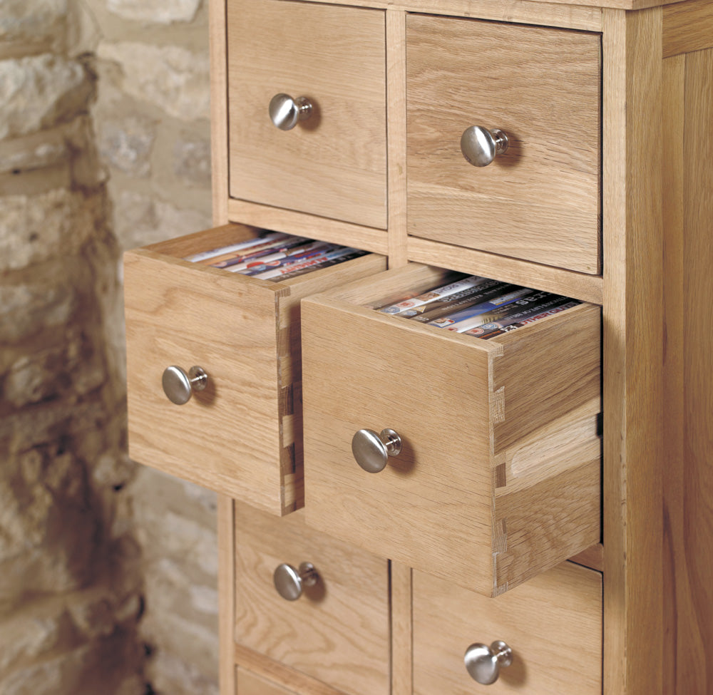 Oak Multi-Drawer DVD / CD Storage Chest :  Oak multi-drawer storage chest of drawers. Stylish solutions for contemporary living. Part of the  Oak living room furniture range.