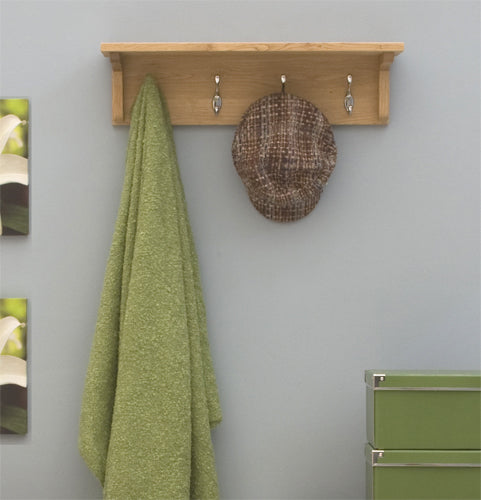 Oak Wall Mounted Coat Rack :  Oak wall mounted coat rack and shelf. Stylish storage solutions for contemporary living. Part of the  Oak hall furniture range.