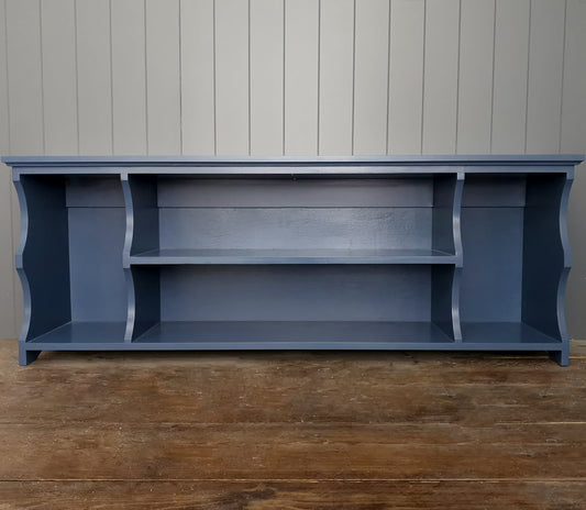 Funky painted hallway bench.  Dark blue boot and shoe storage