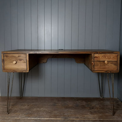 A hand made retro style desk in a dark wood finish. A square drawer at either end and standing on cast iron retro  hairpin legs. Mid century look for a home office.