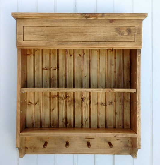 Hand made antique pine spice rack with adjustable shelf and 4 mug pegs.